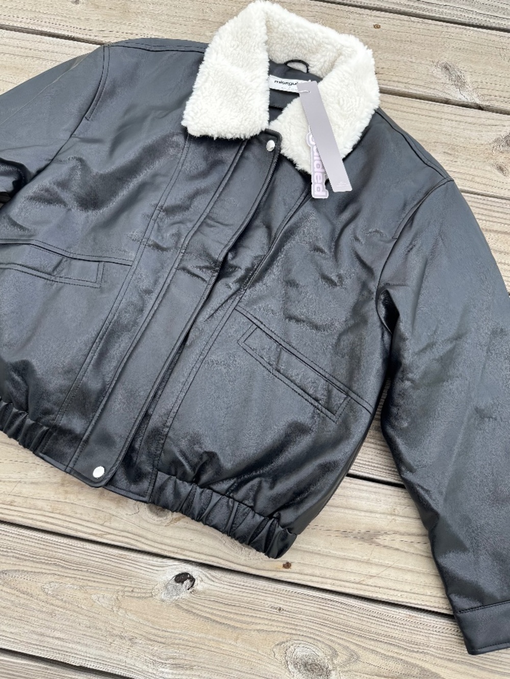 Black faux leather puffer jacket from Missguided, size L, new with tags.